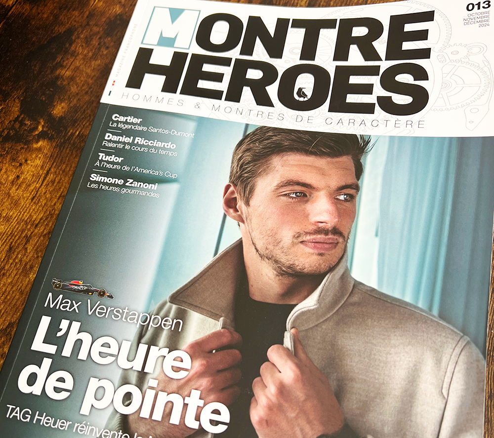 Magazine numéro 013 de Montre Heroes posé sur une table en bois avec en couverture principale : Max Verstappen.